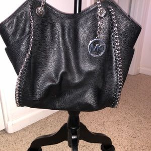 Michael Kor’s large pebbled leather bag with chain detail